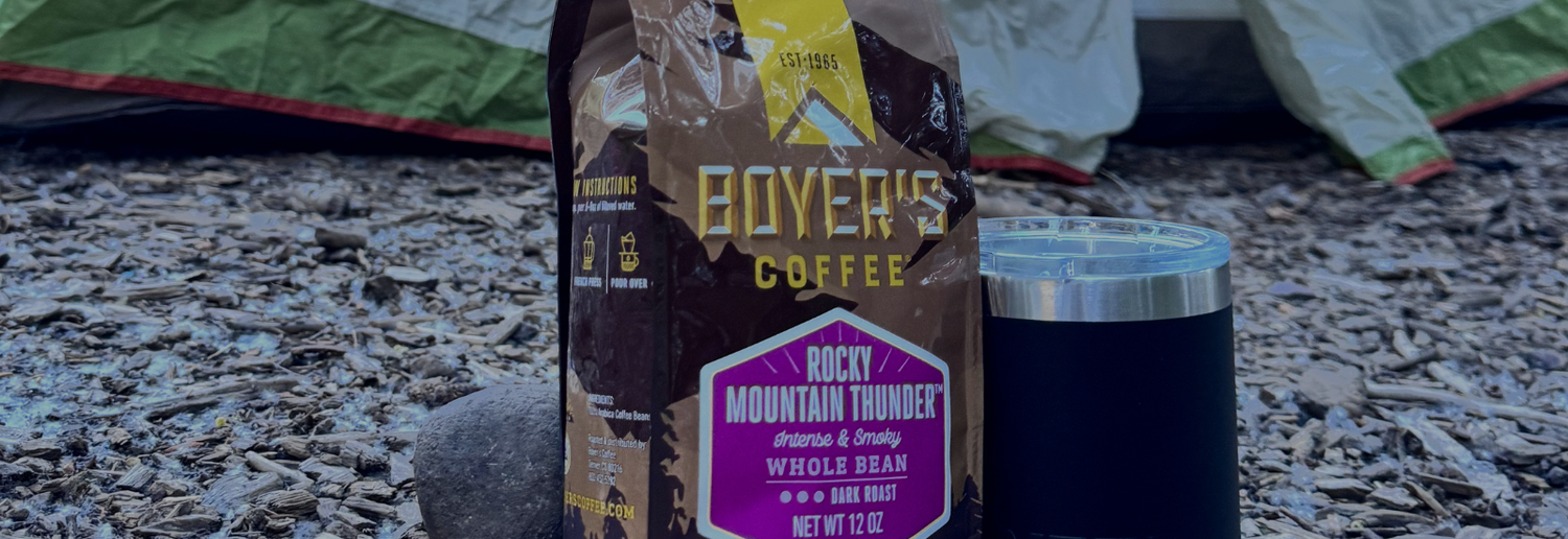 Boyer's Coffee package with a camping scene in the background